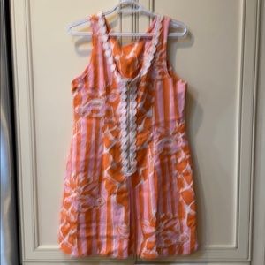 Lily Pulitzer dress-zipper suppose to be back. I like it worn in the front.